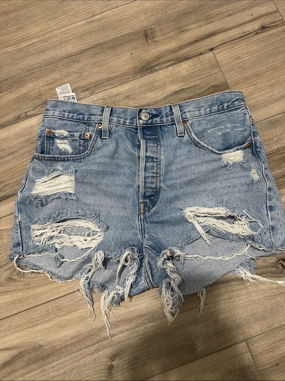 Levi’s High-Rise Distressed Light Blue Denim Shorts